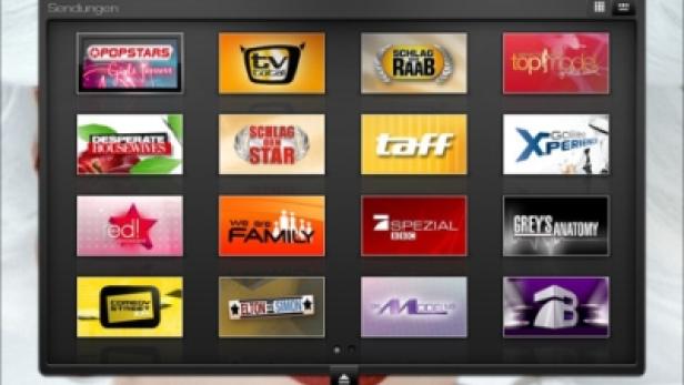 Ein Tablet zeigt eine Auswahl an Fernsehsendungen, darunter „Popstars“ und „Grey's Anatomy“.