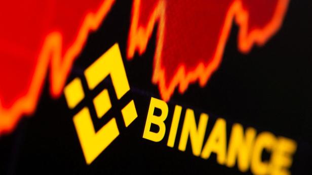 FILE PHOTO: Binance logo and stock graph are displayed in this illustration