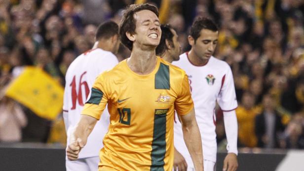 Robbie Kruse of Australia celebrates after scoring the third goal during their World Cup qualifying soccer match against Jordan at Etihad Stadium, Melbourne June 11, 2013. REUTERS/Brandon Malone (AUSTRALIA - Tags: SPORT SOCCER)