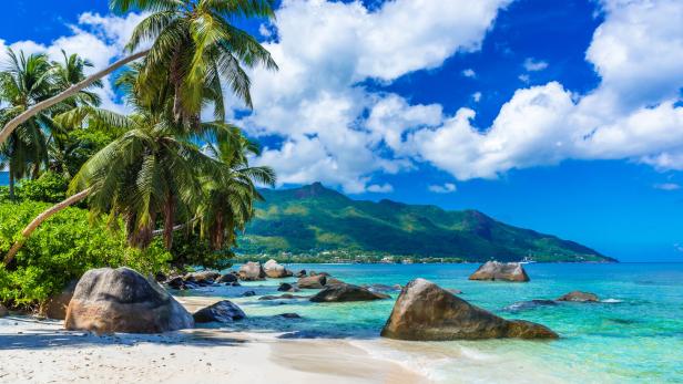 Baie Beau Vallon - Beach on island Mahe in Seychelles Baie Beau Vallon - Beach on island Mahe in Seychelles