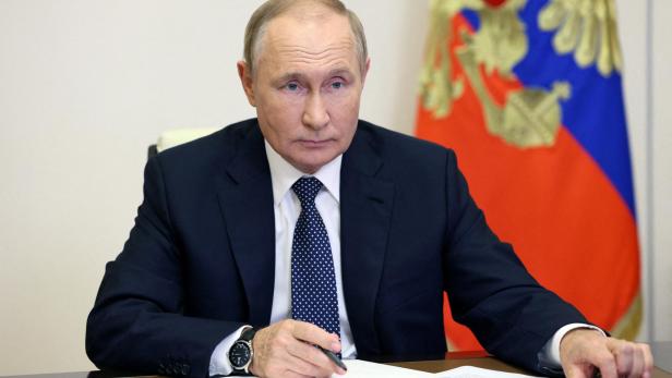 FILE PHOTO: Russian President Vladimir Putin takes part in a video conference with a group of award-winning teachers