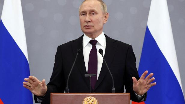 Russian President Putin attends a news conference in Astana