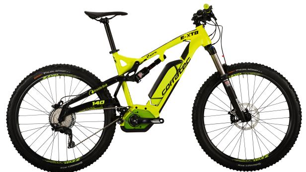 Ein gelbes Corratec E-XTB E-Mountainbike mit Continental Trail King Reifen.