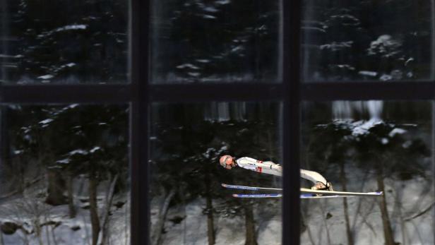 Fettner of Austria soars through the air during th