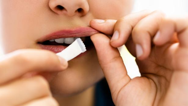 Woman Chewing Wet Moist Nicotine Product