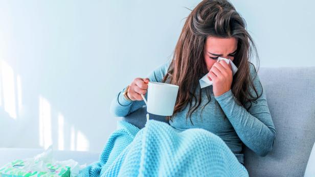 Sick woman with seasonal infections