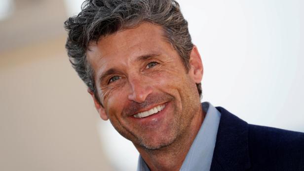 FILE PHOTO: Actor Patrick Dempsey poses during a photocall for the television series "Devils" during the annual MIPCOM television programme market in Cannes