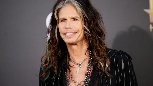 FILE PHOTO: Singer Steven Tyler of Aerosmith arrives at the Hollywood Film Awards in Hollywood