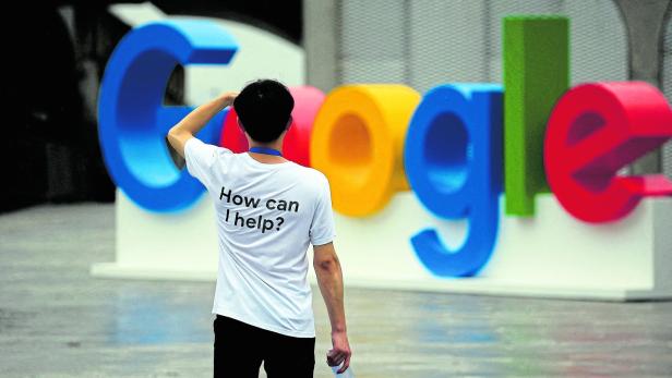 FILE PHOTO: A Google sign is seen during the WAIC (World Artificial Intelligence Conference) in Shanghai