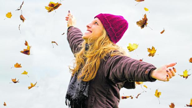 Happy woman in fall