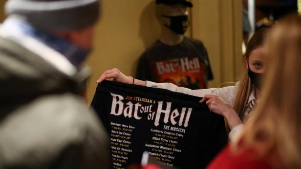 People arrive at the performance of 'Bat Out of Hell', in London