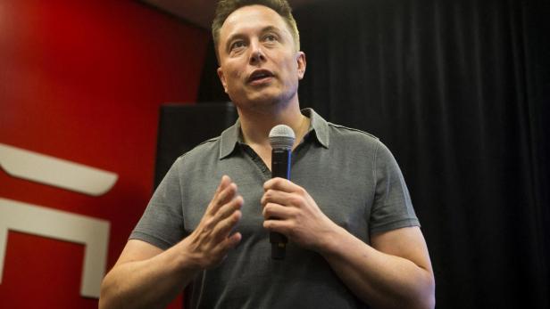 FILE PHOTO: Tesla CEO Elon Musk speaks about new Autopilot features during a Tesla event in Palo Alto