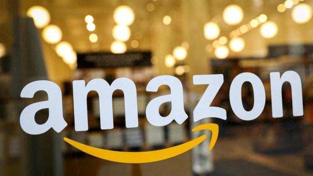 FILE PHOTO: FILE PHOTO: The logo of Amazon is seen on the door of an Amazon Books retail store in New York