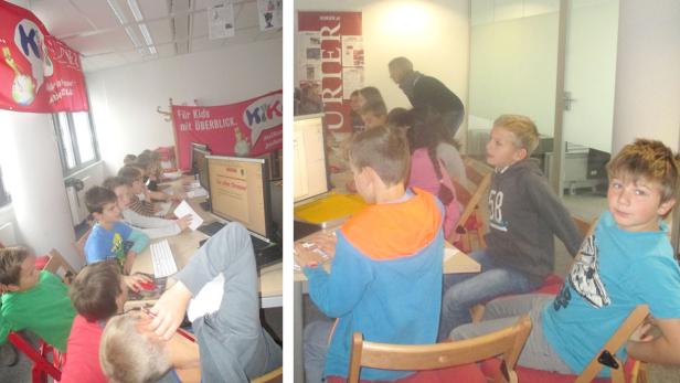 Eine Gruppe Kinder sitzt an Computern in einem Raum mit Bannern der Marke „Kurier für Kids“.