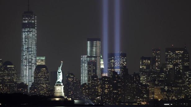 The Tribute in Light is illuminated next to the St