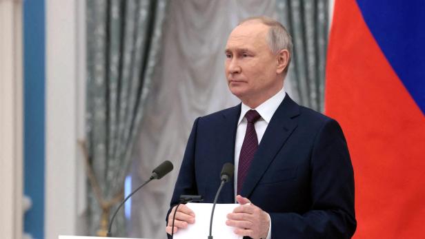 FILE PHOTO: Russian President Putin attends a ceremony marking International Women's Day