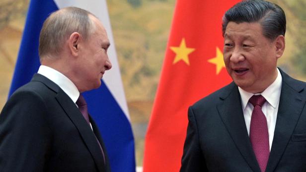 FILE PHOTO: Russian President Putin meets Chinese President Xi in Beijing