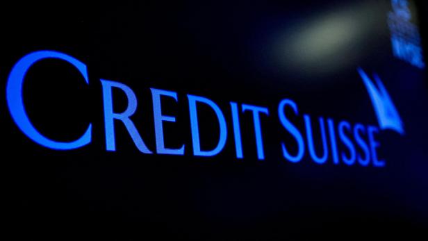 FILE PHOTO: FILE PHOTO: The Credit Suisse logo is displayed on a screen on the floor of the NYSE in New York