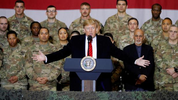 FILE PHOTO: U.S. President Donald Trump makes an unannounced visit to U.S. troops at Bagram Air Base in Afghanistan