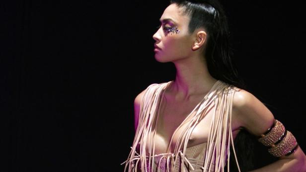 A model presents a creation by designer Serkan Cur