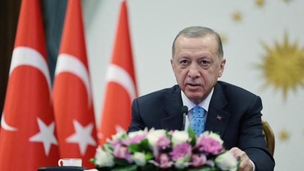 Turkish President Tayyip Erdogan attends a ceremony in Ankara