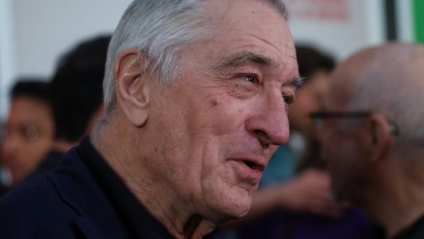 Robert De Niro speaks with media on the red carpet during the premiere of his film "About My Father" in New York City Robert De Niro