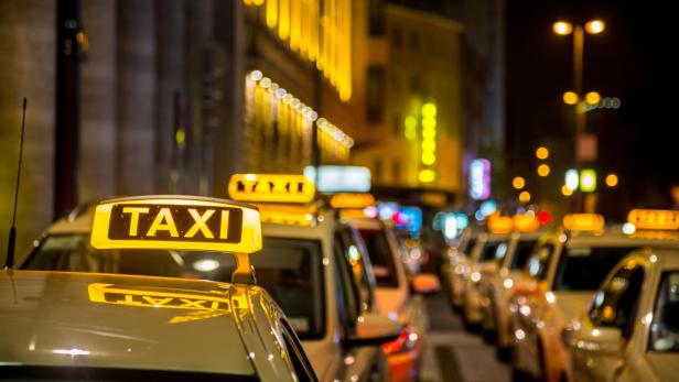 Group of European Taxis at Night