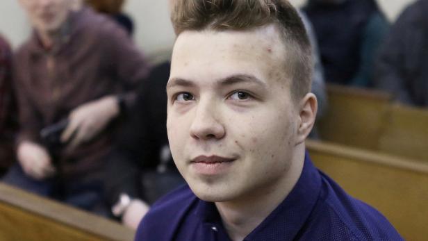 FILE PHOTO: Opposition blogger and activist Roman Protasevich attends a court hearing in Minsk