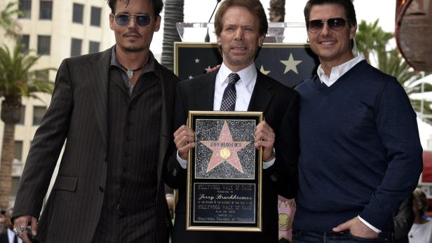 Johnny Depp, Jerry Bruckheimer und Tom Cruise bei der Enthüllung von Bruckheimers Stern auf dem Walk of Fame.