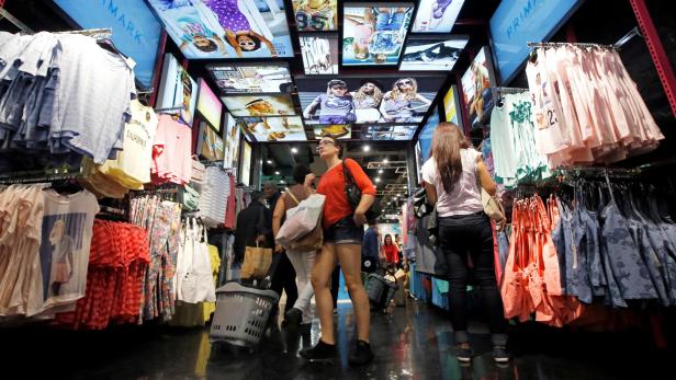 FILE PHOTO: Customers shop at a Primark store on Oxford Street in London