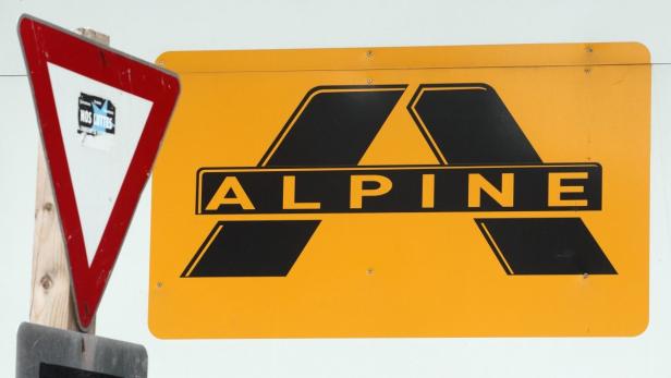 A logo of Alpine Bau is pictured next to a traffic sign at a construction site in Vienna June 25, 2013. Austria&#039;s centrist coalition agreed a 1.5 billion euro ($1.96 billion) economic stimulus plan on Tuesday, eager to show voters before September elections that the government is ready to counter any downturn. Spurred by the insolvency last week of Alpine Bau, the country&#039;s second-biggest construction group that employs nearly 5,000 people in Austria, the plan approved by the cabinet aims to lend the economy a hand over the 3-1/2 years to end-2016 without boosting public debt. REUTERS/Heinz-Peter Bader (AUSTRIA - Tags: BUSINESS CONSTRUCTION LOGO EMPLOYMENT POLITICS)