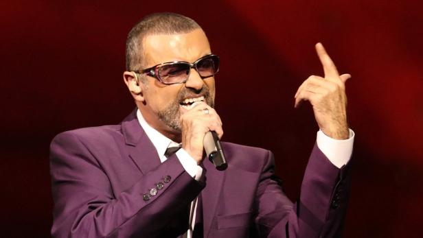 REUTERSBritish singer George Michael performs on stage during his "Symphonica" tour concert in Vienna September 4, 2012. George Michael hailed the Vienna medical team that brought him back from the brink of death last year as he prepared to resume his tou