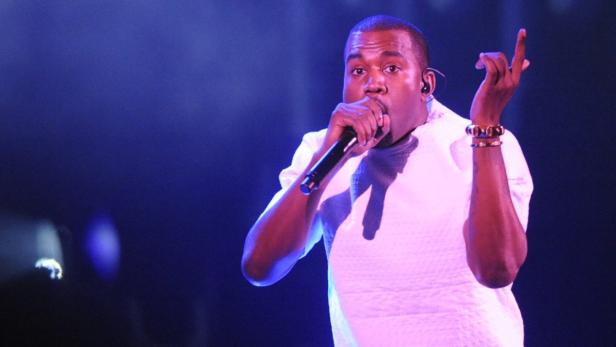 Kanye West performs at the 2012 BET Awards in Los Angeles on July 1, 2012. REUTERS/Phil McCarten (UNITED STATES - Tags:ENTERTAINMENT) (BET-SHOW)