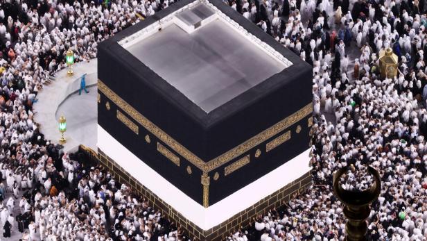 Muslim pilgrims perform the Umrah at the Holy Kaaba, in the holy city of Mecca