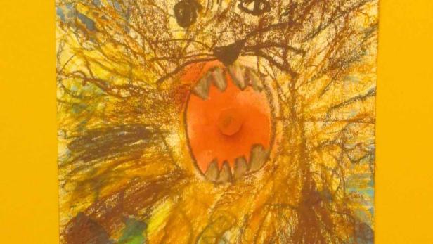 Eine Kinderzeichnung zeigt das Gesicht eines Löwen mit aufgerissenem Maul.