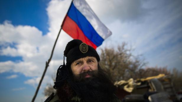 Ein serbischer Kämpfer, Teil einer paramilitärischen Tschetnik-Gruppe, auf der Krim - mehrere serbische Freischärler sollen die Krim-Separatisten unterstützen