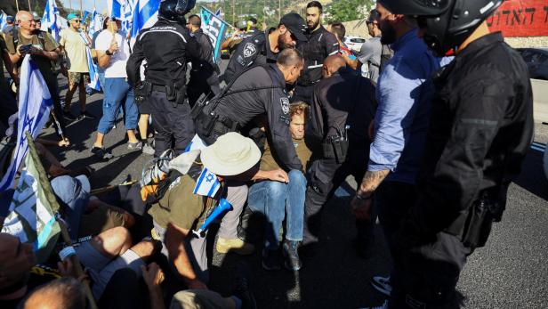 People block a highway to Jerusalem on 'Day of Paralysis' in protest against Israel's judicial overhaul