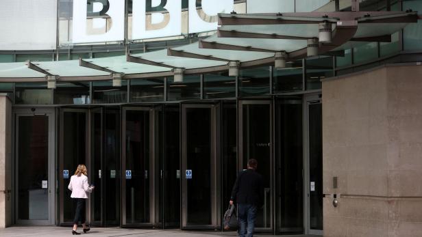 People enter the BBC headquarters in London
