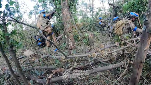 Ukrainian soldiers are seen at their positions on the front line