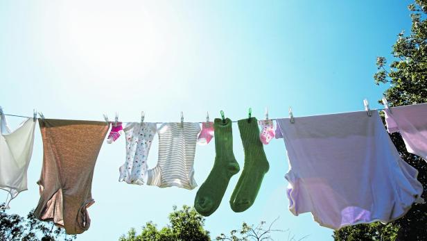 washing on line one pair of green socks