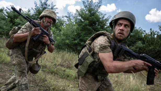 Ukrainian service members attend military drills in Dnipropetrovsk region
