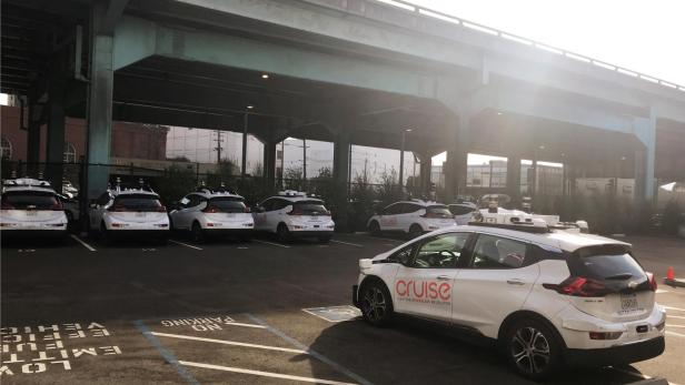 FILE PHOTO: A Cruise self-driving car, which is owned by General Motors Corp, is seen outside the companys headquarters in San Francisco