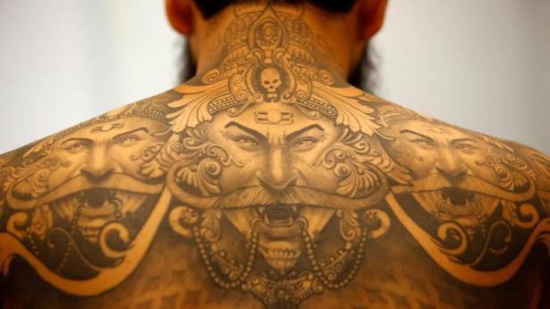 FILE PHOTO: A tattoo of Hindu demon Ravan is pictured on a back of a man during the Nepal Tattoo Convention in Kathmandu