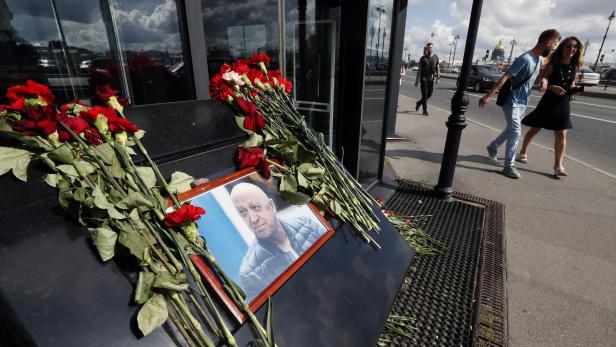 People visit an informal memorial in remembrance of Wagner chief in Russia