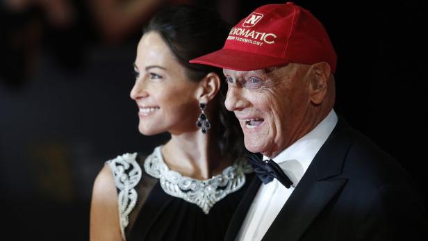 Niki Lauda mit seiner Frau auf einer Veranstaltung.