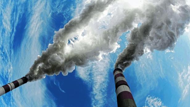 FILE PHOTO: Smoke billows from the chimneys of Belchatow Power Station in Poland