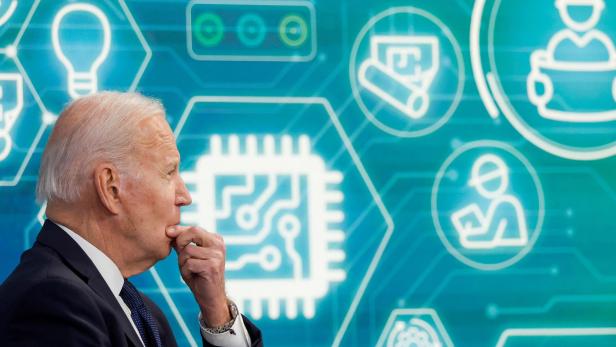 FILE PHOTO: U.S. President Biden and Commerce Secretary Raimondo hold a virtual meeting with business leaders and state governors, in Washington