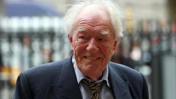 FILE PHOTO: Actor Michael Gambon attends a Service of Thanksgiving for Sir Peter Hall at Westminster Abbey in London