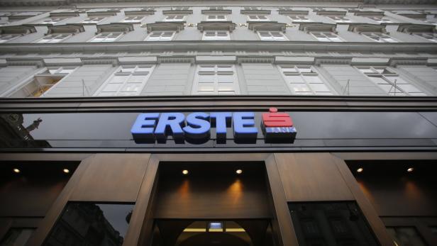 The entrance of the headquarters of Austrian Erste Group Bank is pictured in Vienna June 24, 2013. Erste Group Bank said on Monday operating profit would fall as much as 5 percent in 2013 rather than holding steady and that it intends to raise its equity capital by about 660 million euros ($867 million) in the third quarter. Central and eastern Europe&#039;s third-biggest lender also said it would repay in the third quarter 1.76 billion euros in non-voting participation capital it got from the state and private investors after the financial crisis began. REUTERS/Leonhard Foeger (AUSTRIA - Tags: BUSINESS)