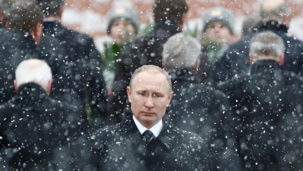 FILE PHOTO: Russian President Putin attends wreath laying ceremony to mark Defender of Fatherland Day at Tomb of Unknown Soldier by Kremlin wall in Moscow